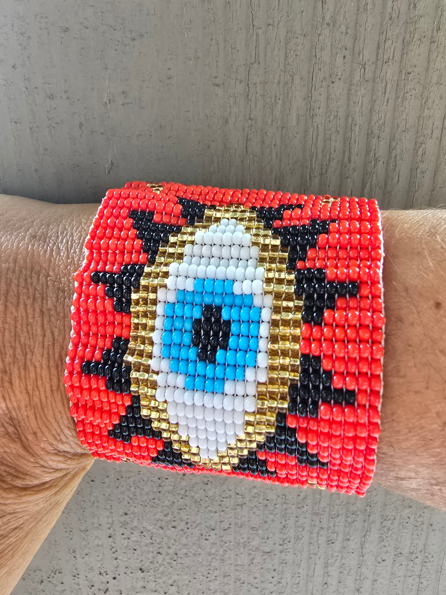 RED BEADED EYE BRACELET