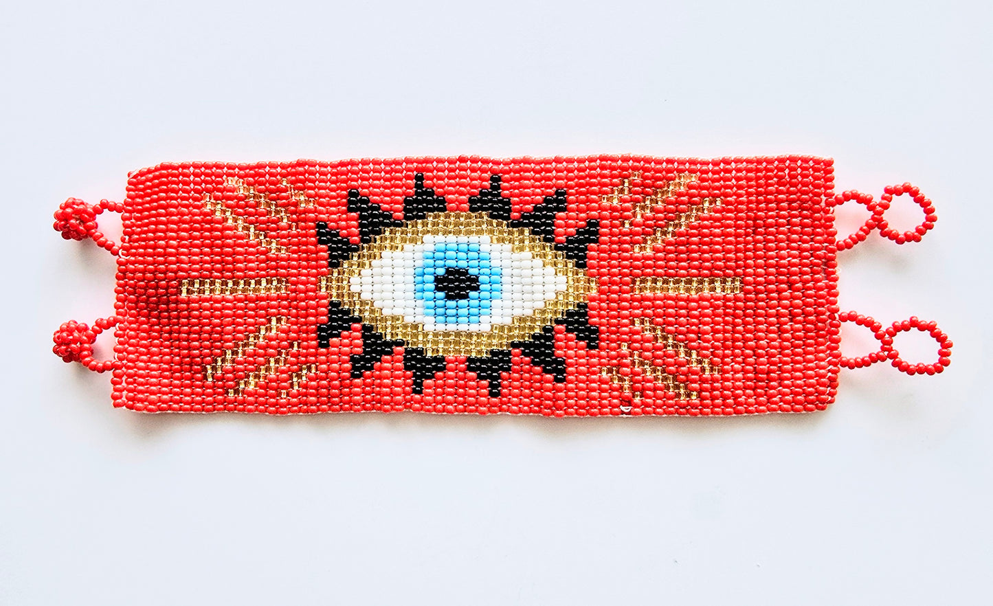 RED BEADED EYE BRACELET